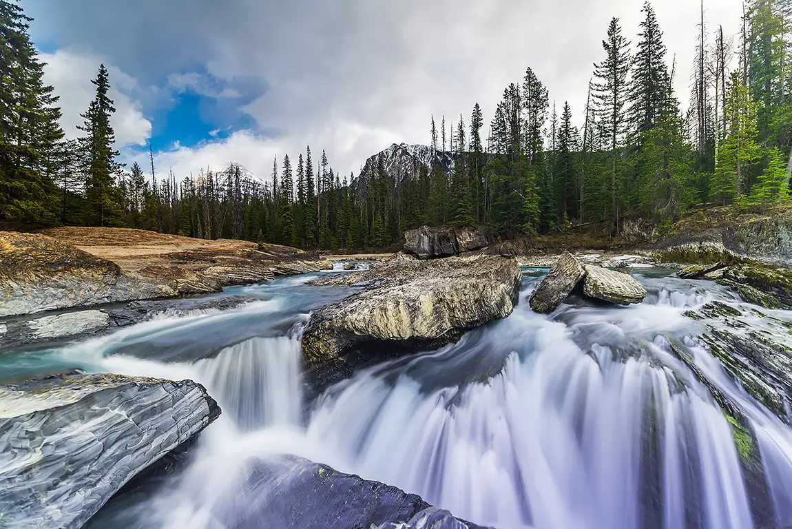 Spring rush at natural bridge, yoho national park, british columbia, canada