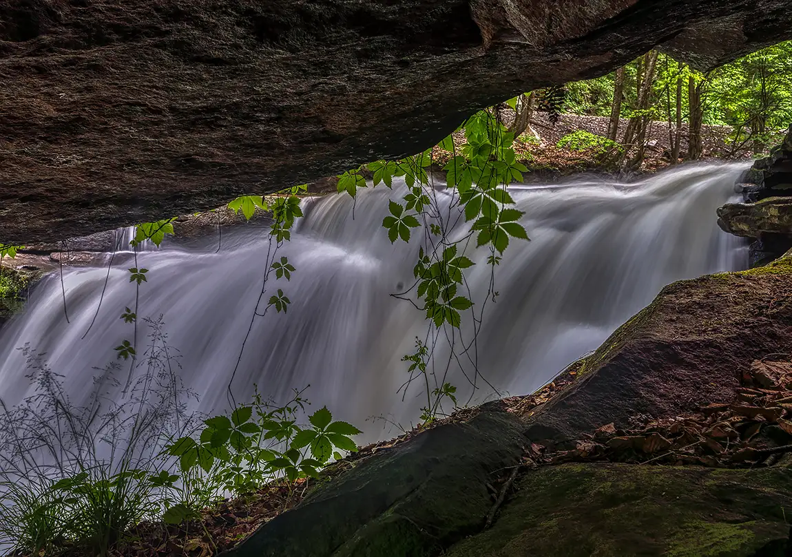 Dunloup falls through boulders, new river gorge np, oak hill, west virginia, usa
