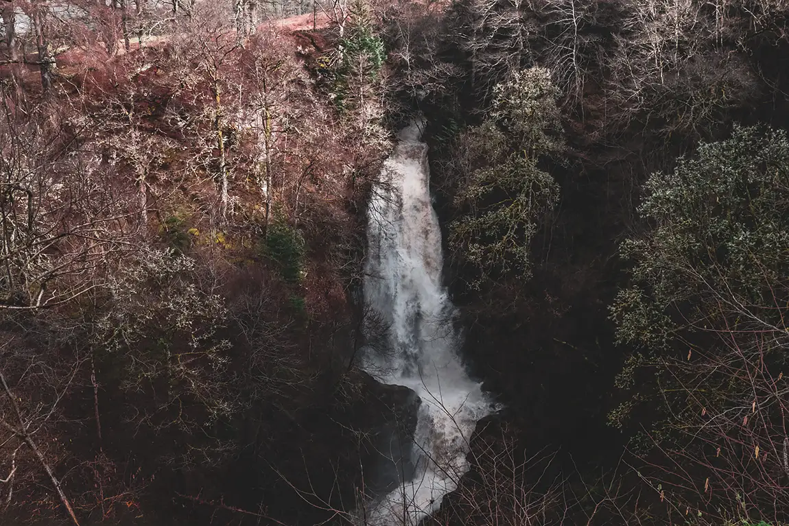 Seasonal waterfall in acharn, scotland
