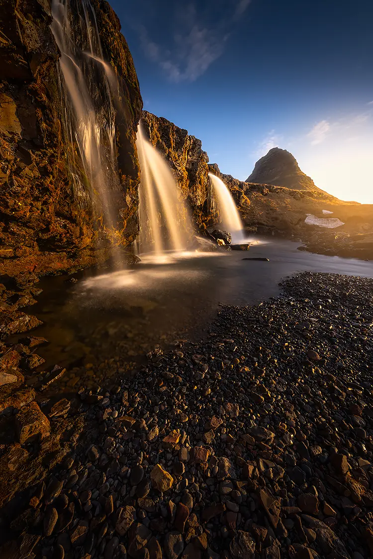 Sunset at kirkjufellsfoss, kirkjufell, iceland
