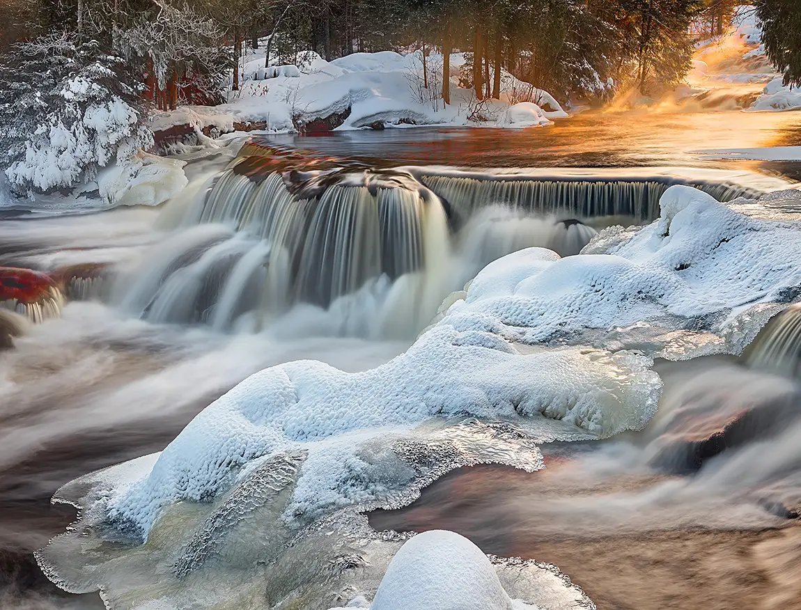 Winter rapids at sunrise, bond falls, michigan, usa