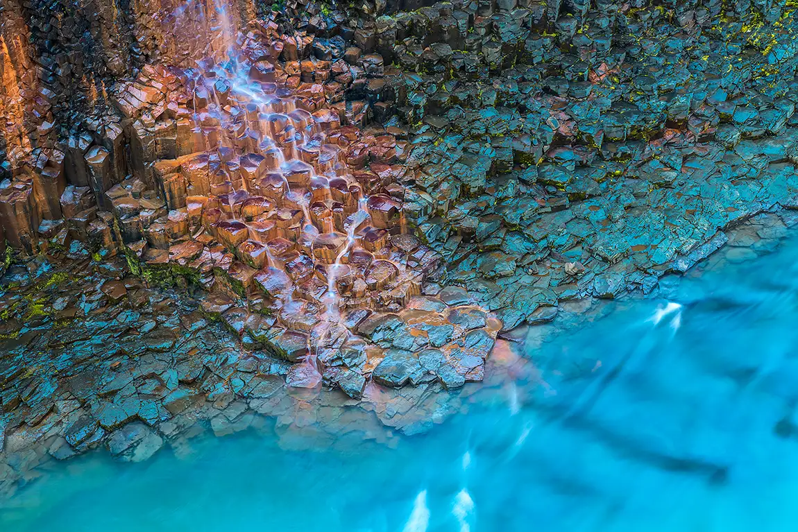 Basalt column spring, studlagil canyon, east iceland
