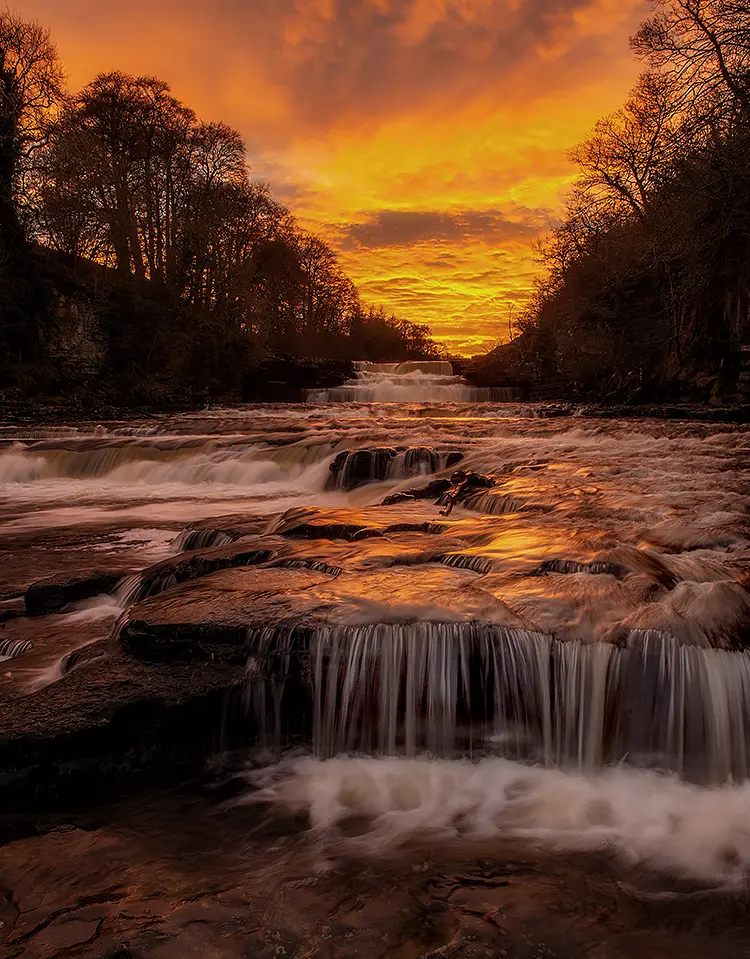Fire in the water, aysgarth falls, north yorkshire, england