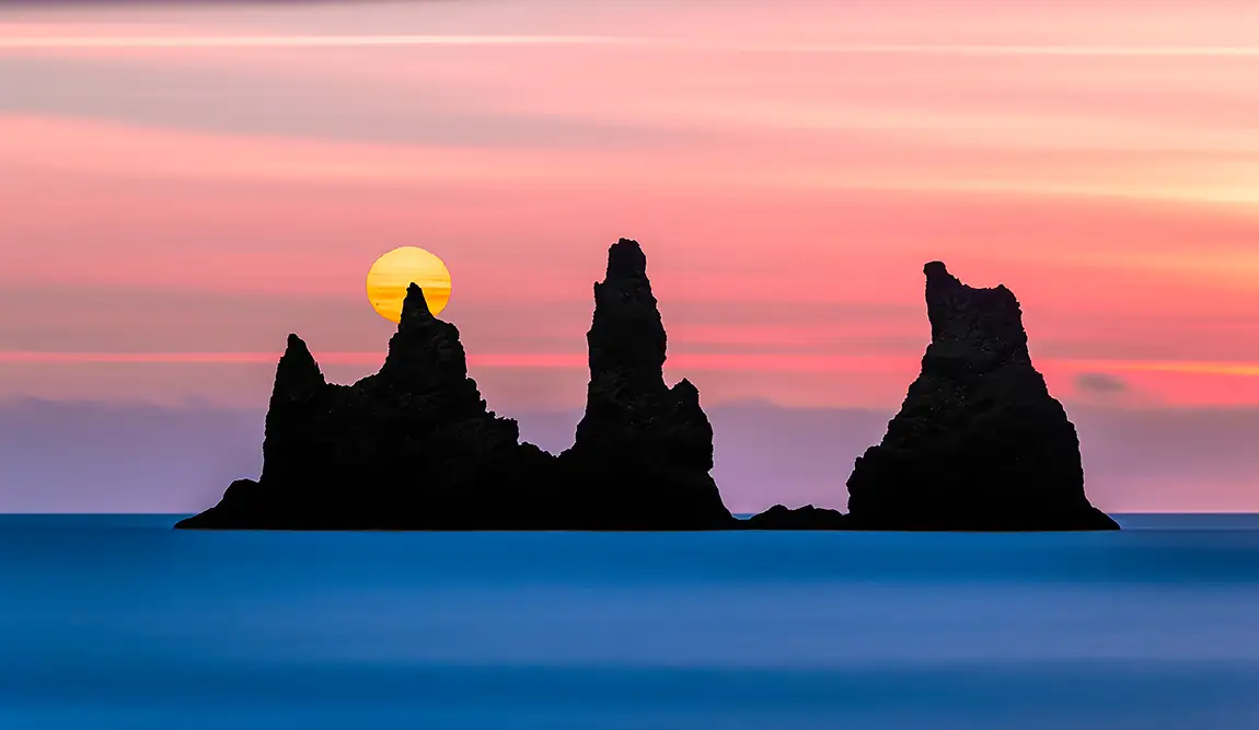 Reynisdrangar at sunset, reynisfjara beach stacks, iceland