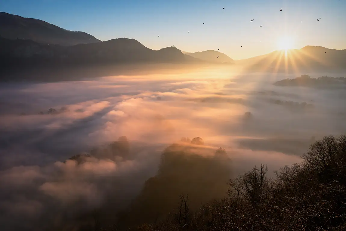 Airuno sunrise over the adda river, lombardia, italy