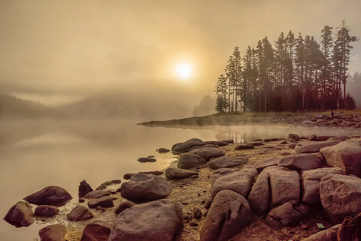 Misty shiroka polyana lake, rhodope mountains, bulgaria