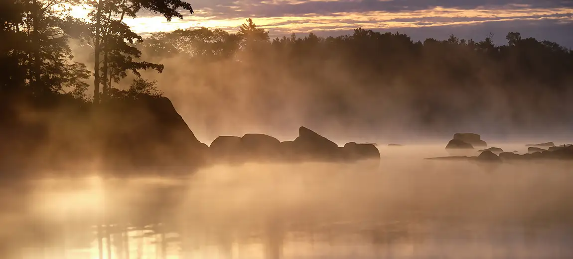 Morning mist on boot lake, south milford, nova scotia, canada