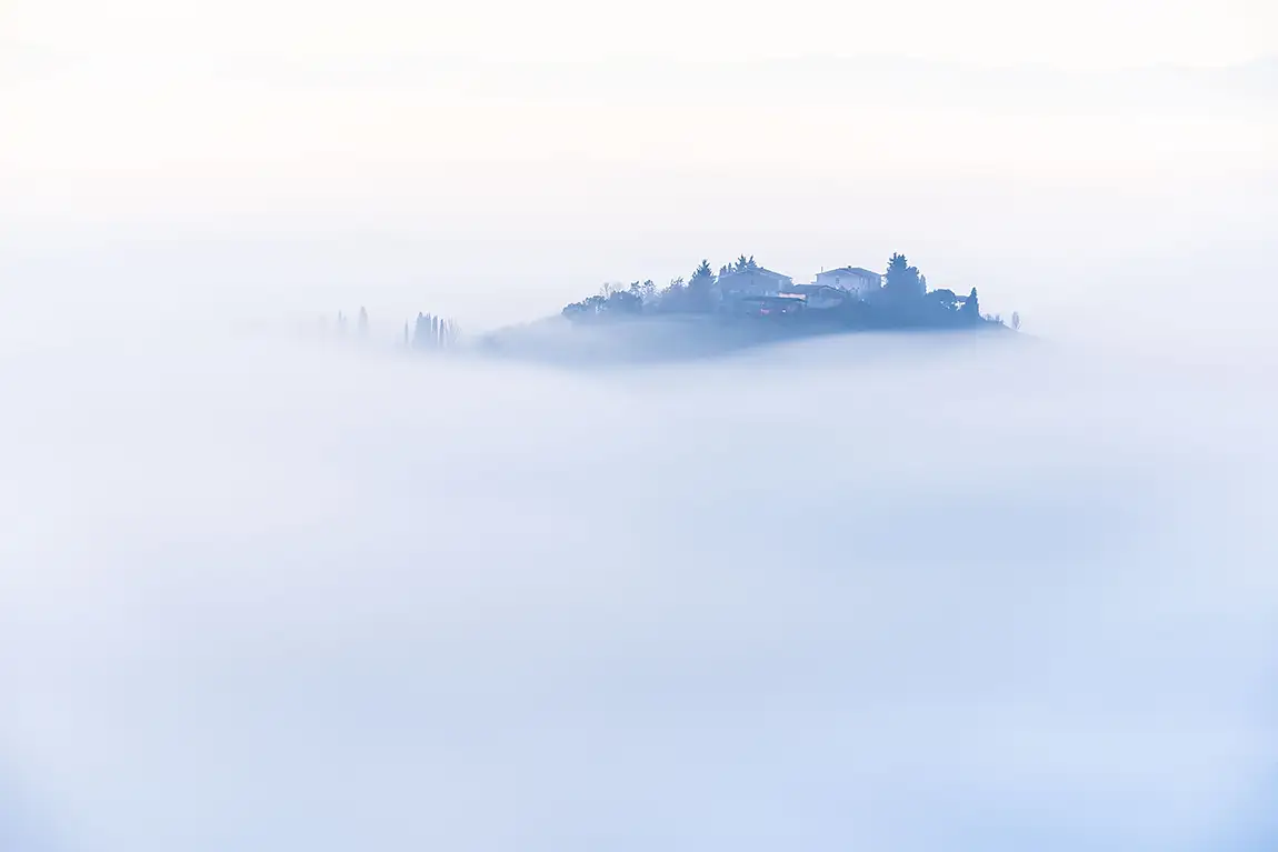 Sunrise with mist, crete senesi, tuscany, italy