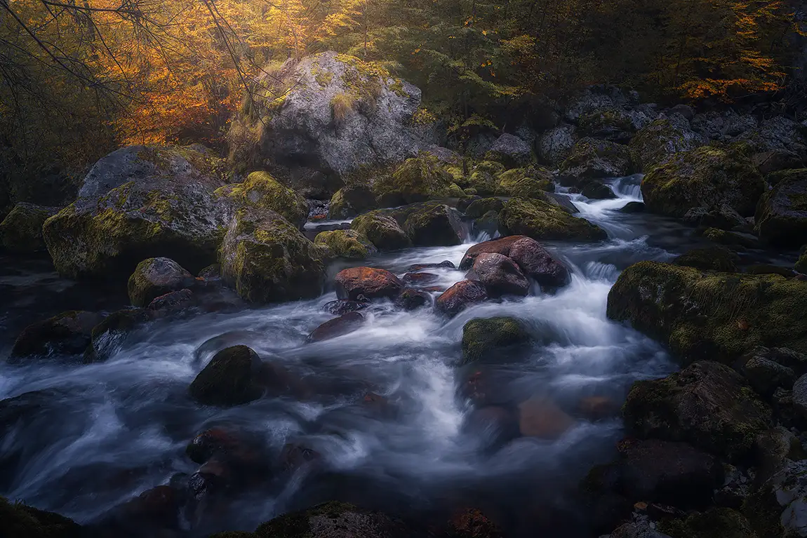 Water, rocks and autumn light in lischiaze, resiutta, udine, italy