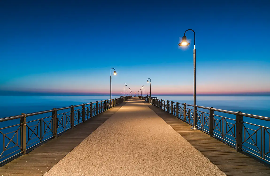 Sunset on the pier, marina di pietrasanta, tuscany, italy