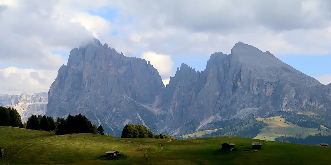 Wooden Cabins And Meadows, Alpe di Siusi, Dolomites, Italy