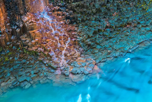 Basalt column spring, studlagil canyon, east iceland