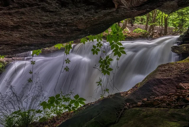 Dunloup falls through boulders, new river gorge np, oak hill, west virginia, usa