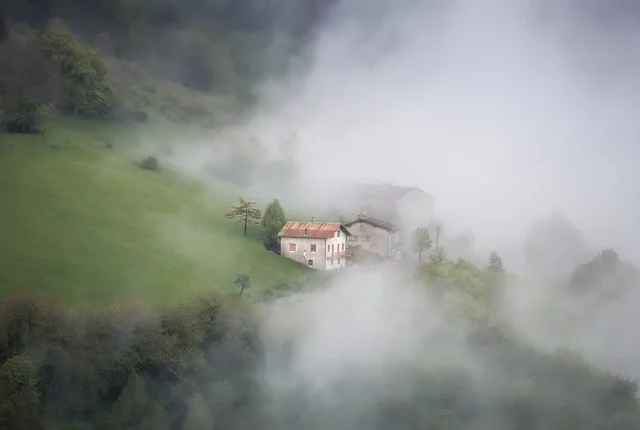 Farmhouse in the mist, foza, altopiano di asiago, italy