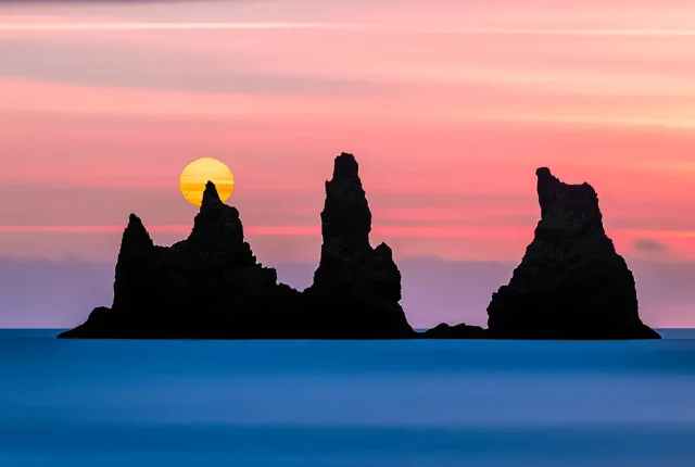 Reynisdrangar at sunset, reynisfjara beach stacks, iceland