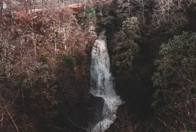 Seasonal waterfall in acharn, scotland
