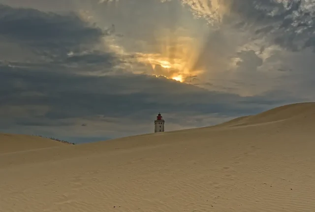 Sun Rays and Desert Lighthouse, Rubjerg Knude Fyr, Denmark
