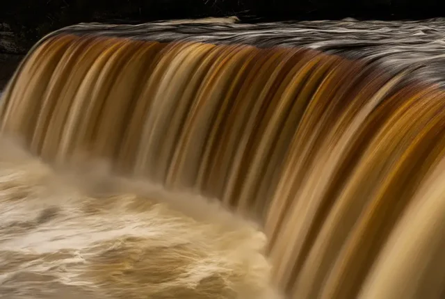 Tan water cascade, tahquamenon falls, michigan, usa