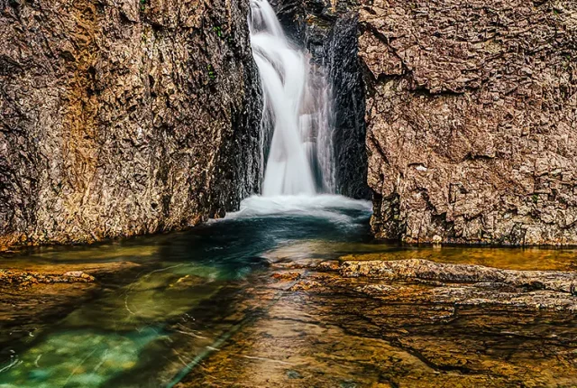 The slim waterfall, fairy pools, isle of skye, scotland