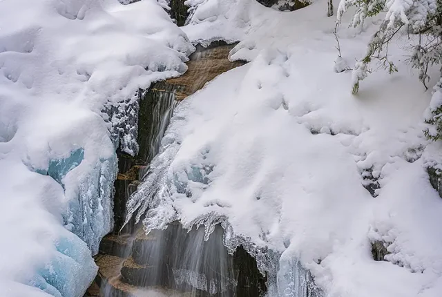 Winter at stairs falls, franconia notch state park, lincoln, new hampshire, usa