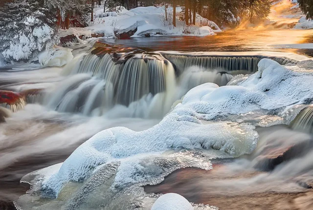 Winter rapids at sunrise, bond falls, michigan, usa