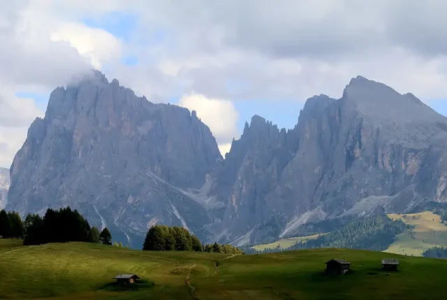 Wooden Cabins And Meadows, Alpe di Siusi, Dolomites, Italy
